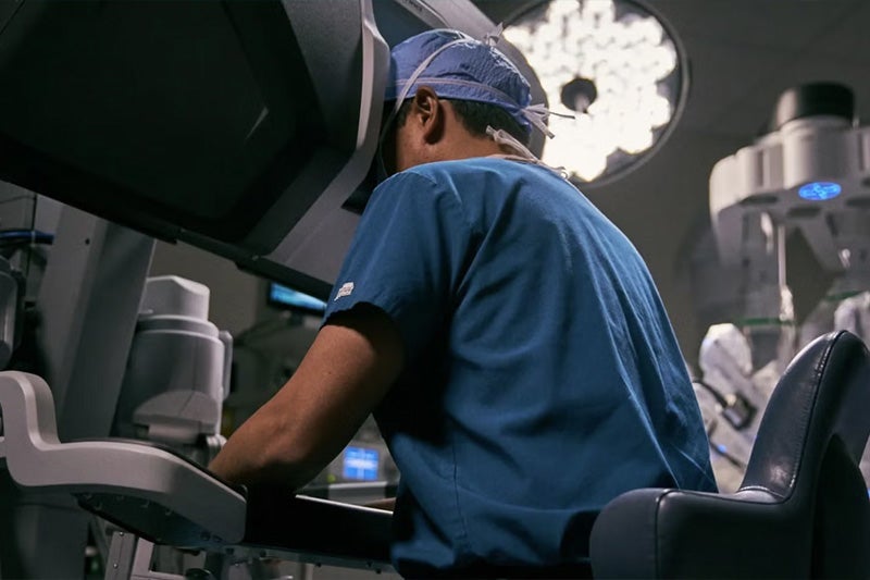Robotic Surgeon at surgery console.