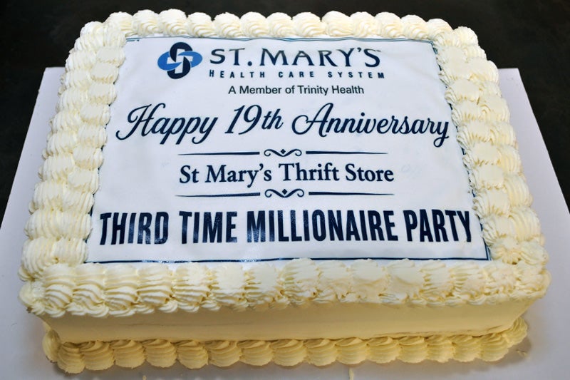 Photograph of 19th Anniversary celebratory cake for Thrift Store staff.