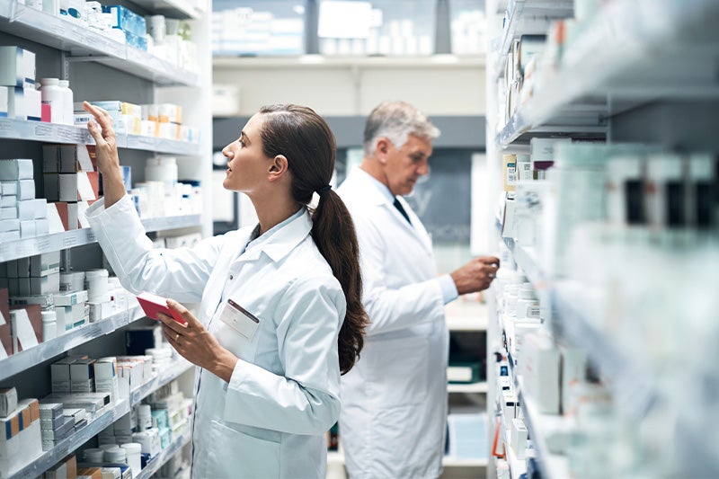 Pharmacists filling prescriptions.