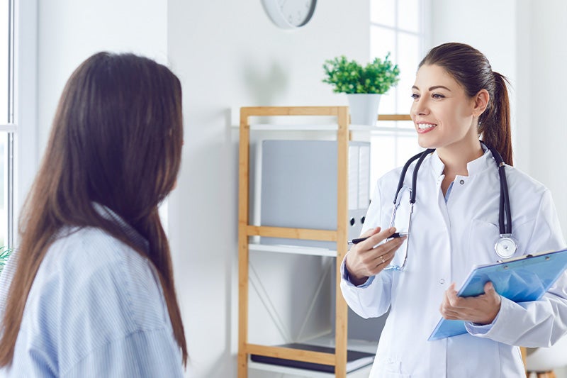 Patient speaking to a physician about antibiotic medications.