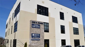 Medical Group office building with a sign by the entrance.